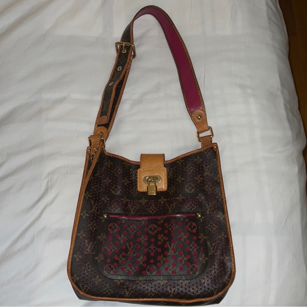 Preowned authentic LOUIS VUITTON Limited Edition Perforated Musette Bag